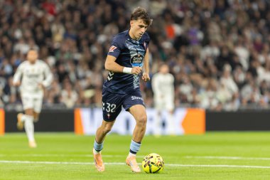 Madrid, Spain - December 7, 2025: La Liga match between Real Madrid and Celta Vigo played at the Bernabu Stadium in Madrid. Celta Vigo players with the ball. Professional league. EA SPORTS