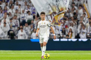 Madrid, Spain - December 7, 2025: La Liga match between Real Madrid and Celta Vigo played at the Santiago Bernabu Stadium in Madrid. Real Madrid players with the ball. Professional league. EA SPORTS