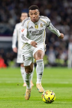 Madrid, Spain - December 7, 2025: La Liga match between Real Madrid and Celta Vigo played at the Santiago Bernabu Stadium in Madrid. Real Madrid players with the ball. Professional league. EA SPORTS