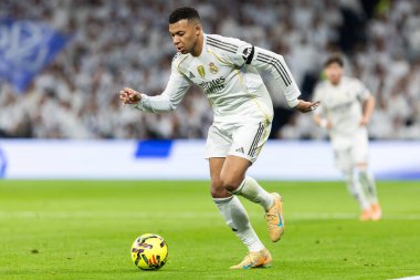 Madrid, Spain - December 7, 2025: La Liga match between Real Madrid and Celta Vigo played at the Santiago Bernabu Stadium in Madrid. Real Madrid players with the ball. Professional league. EA SPORTS