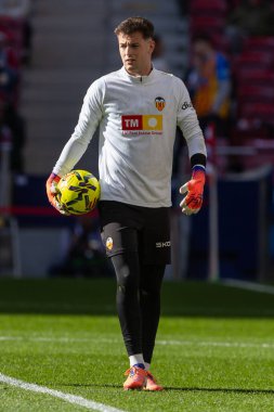 Madrid, İspanya - 13 Aralık 2025: Madrid 'de Atletico Madrid ile Valencia CF arasında oynanan lig maçı. Valencia FC oyuncuları maç sırasında. EA Spor Ligi.
