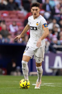 Madrid, İspanya - 13 Aralık 2025: Madrid 'de Atletico Madrid ile Valencia CF arasında oynanan lig maçı. Valencia FC oyuncuları maç sırasında. EA Spor Ligi.