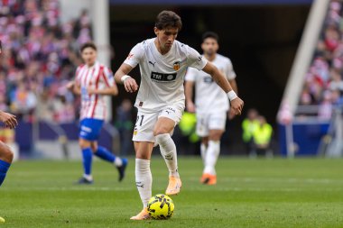 Madrid, İspanya - 13 Aralık 2025: Madrid 'de Atletico Madrid ile Valencia CF arasında oynanan lig maçı. Valencia FC oyuncuları maç sırasında. EA Spor Ligi.