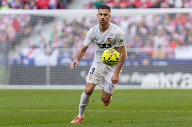 Madrid, İspanya - 13 Aralık 2025: Madrid 'de Atletico Madrid ile Valencia CF arasında oynanan lig maçı. Valencia FC oyuncuları maç sırasında. EA Spor Ligi.