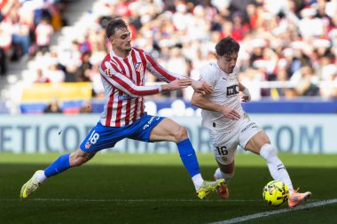 Madrid, İspanya - 13 Aralık 2025: Madrid 'de Atletico Madrid ile Valencia CF arasında oynanan lig maçı. Maç sırasında Atletico Madrid oyuncuları. EA Spor Ligi.