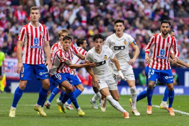 Madrid, İspanya - 13 Aralık 2025: Madrid 'de Atletico Madrid ile Valencia CF arasında oynanan lig maçı. Valencia FC oyuncuları maç sırasında. EA Spor Ligi.