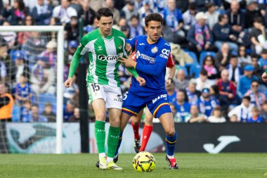 Madrid, İspanya - 8 Mart 2026: Getafe FC ile Real Betis arasında oynanan lig maçı. Profesyonel futbolcular. EA Spor Ligi. İspanya Ligi.