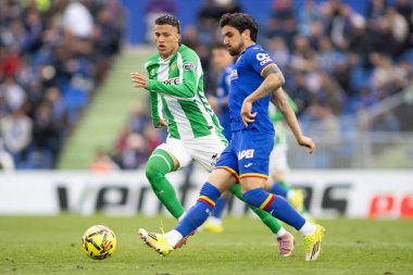 Madrid, İspanya - 8 Mart 2026: Getafe FC ile Real Betis arasında oynanan lig maçı. Profesyonel futbolcular. EA Spor Ligi. İspanya Ligi.
