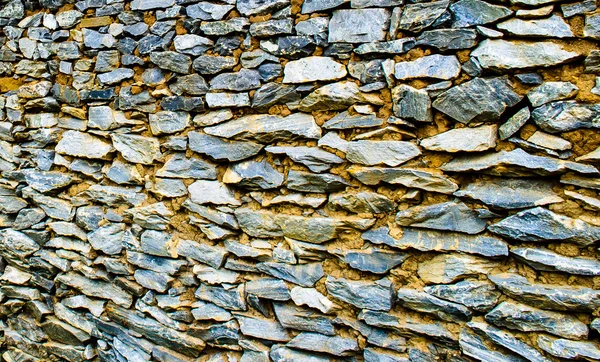 Pared de piedra construida en el estilo antiguo — Foto de Stock
