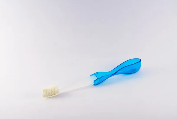 Folded toothbrush Stock Photo