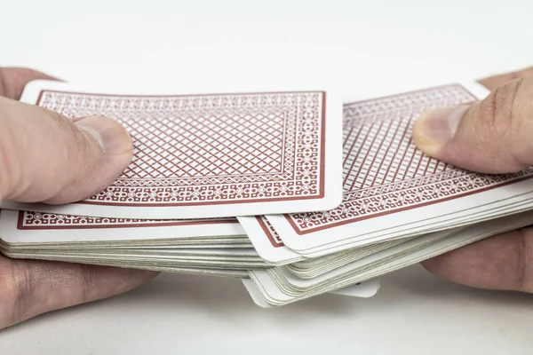 Manos Barajando Cartas Sobre Fondo Blanco —  Fotos de Stock