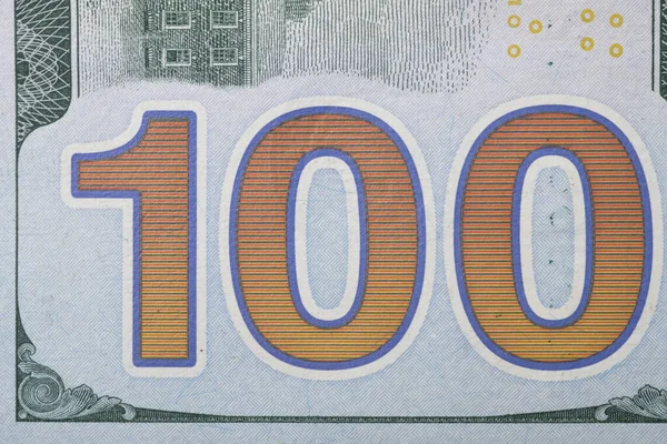 Zbliżenie Banknotu 100 Dolarowego Liczbą 100 — Zdjęcie stockowe