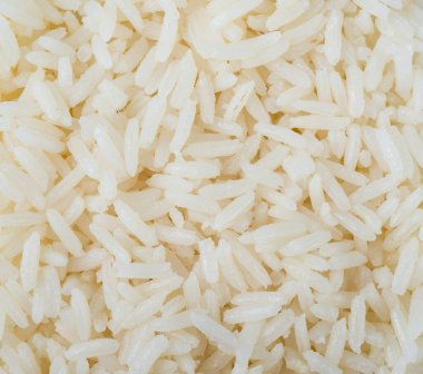 Pişmiş beyaz pirincin yakın çekimi. Yemek arkaplanı.