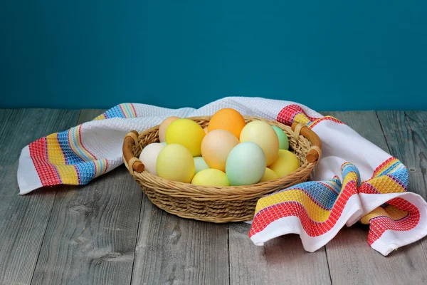 Easter still life with eggs in a basket — Stock Photo, Image