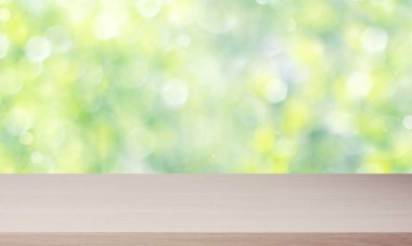 Bokeh ile bulanık bahar arkaplanındaki boş ışık tablosu. nesnenizin kurulumu için arkaplan. Model, sahne oluşturucu.