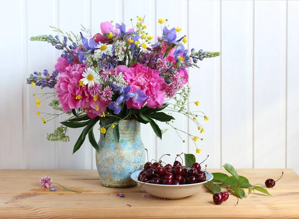Flowers Herbs Jug Cherries Table Summer Still Life Bouquet Peonies — Stock Photo, Image
