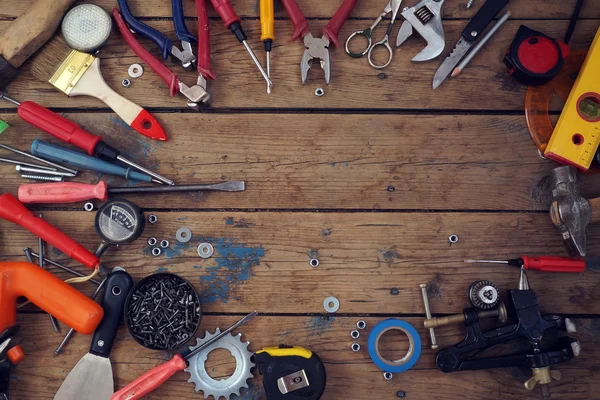 Tools on a timber floor — Stock Photo, Image