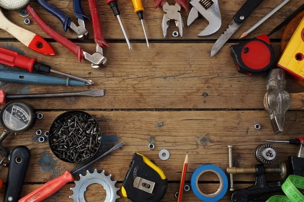 Tools on a timber floor — Stock Photo, Image