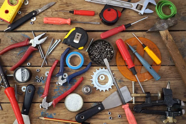 Tools on a timber floor — Stock Photo, Image