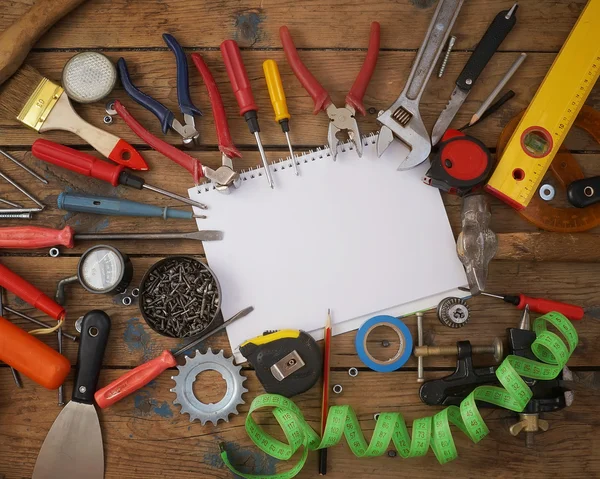 Tools on a timber floor — Stock Photo, Image