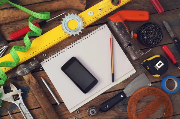 Tools on a timber floor — Stock Photo, Image