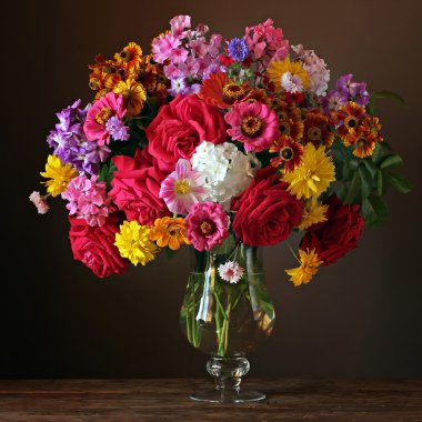 Still life with a beautiful bouquet of cultivated flowers  clipart