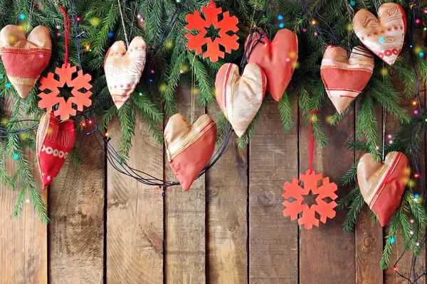 Background from boards with fir-tree branches from above