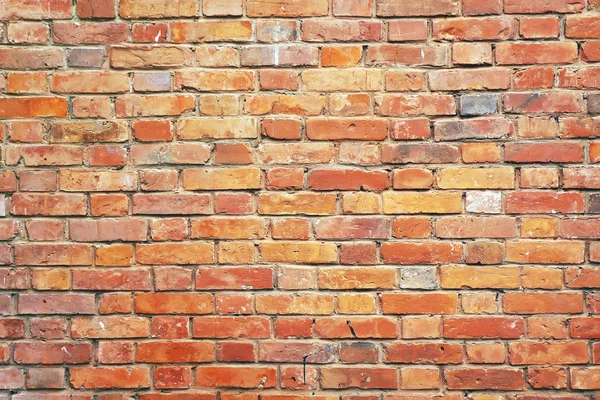 Van een rode bakstenen muur — Stockfoto