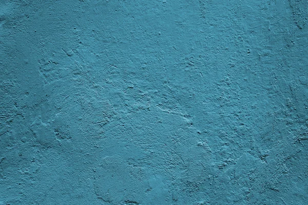 Синій фон. Помаранчева текстура. Блакитна стіна . — стокове фото