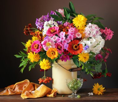 Still life with flowers and berries. clipart