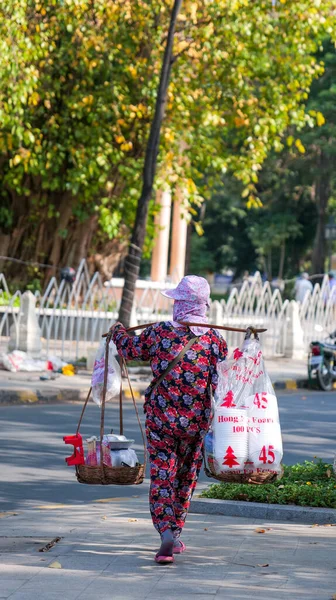 Woman selling food on the street in Cambodia