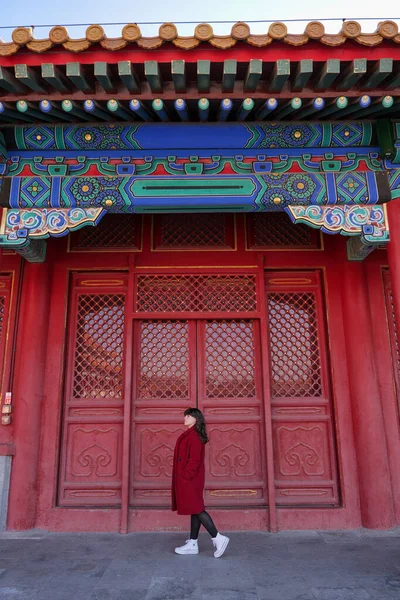 Young woman posing in Beijing\'s Forbidden City