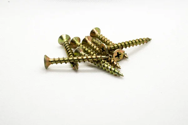 Close View Bunch Golden Screws White Surface — Stock Photo, Image