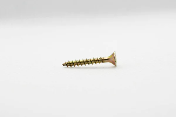 Close View Isolated Golden Screw White Surface — Stock Photo, Image