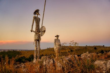 Don Quijote and Sancho Panza iron monuments. Located on the top of a hill near Tandil, Buenos Aires, Argentina.                             