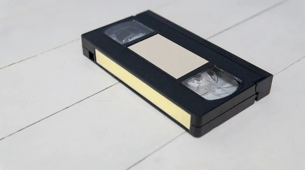 Vista Vicino Vecchio Nastro Vhs Con Etichetta Vuota Una Superficie — Foto Stock