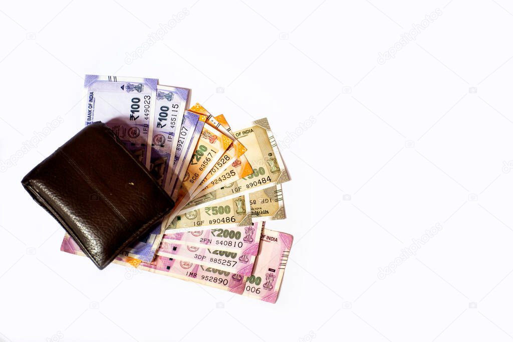 Wallet with Indian currency isolated on white background