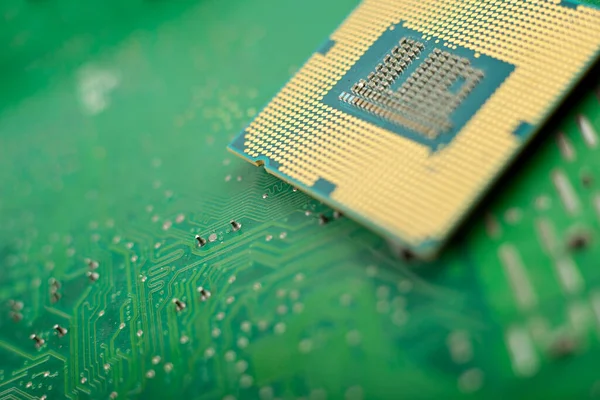 Close-up of computer processor on electrical circuit board.