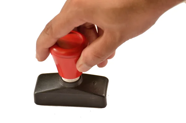 Lastik damgası beyaz arka plan üzerinde izole tutan eller