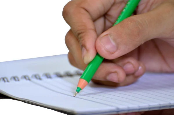 Human hand writing on a notepad — Stock Photo, Image