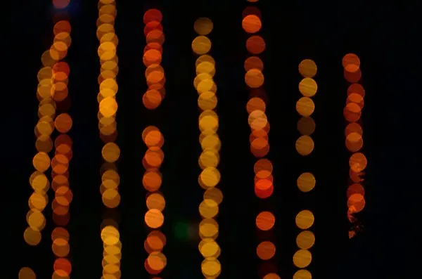 Parlak parlayan kırmızı ve turuncu ışık — Stok fotoğraf