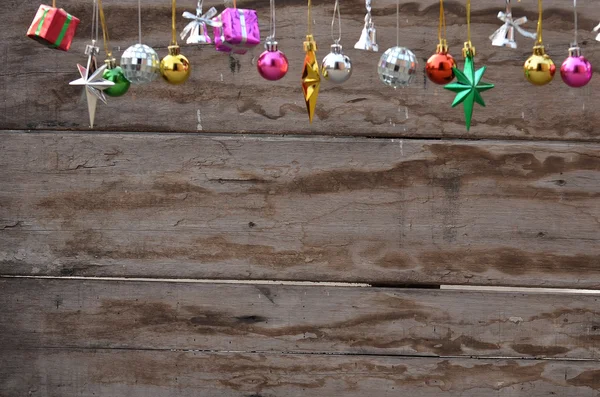 Christmas gift with wooden background — Stock Photo, Image