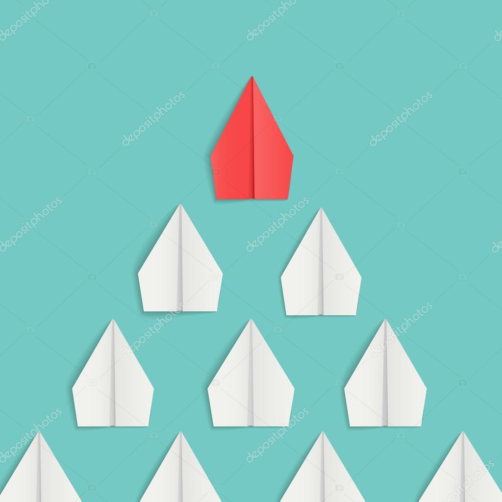 Leadership concept with red paper airplane leading among white.