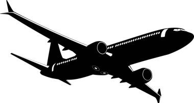 İniş takımları açık olan bir yolcu uçağının silüeti..