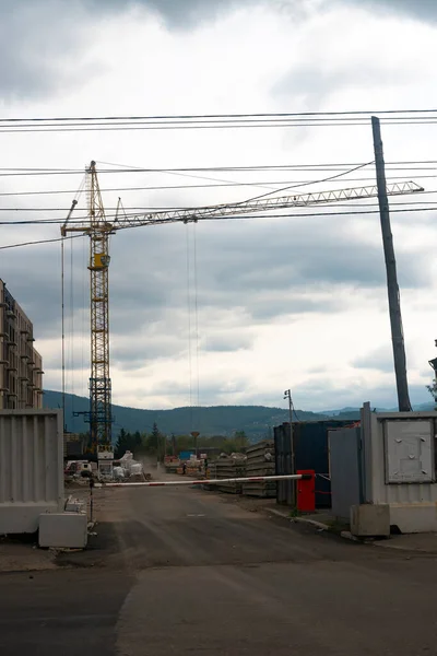 Construction work at a construction site. Closed area with a gate. — Stock Photo, Image