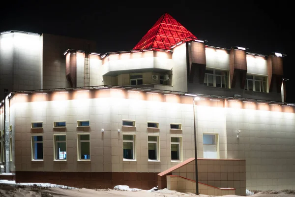 The building is abundantly illuminated by lanterns at night. — Stock Photo, Image