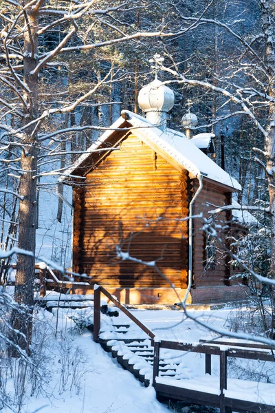 Orthodox Church in the winter in the forest. — Stock Photo, Image