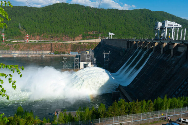 Discharge of water at a hydroelectric power plant.