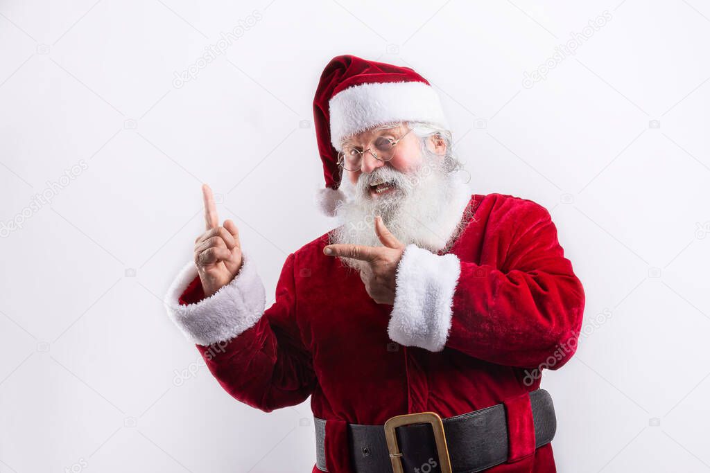 Happy Santa Claus, pointing a side in white background
