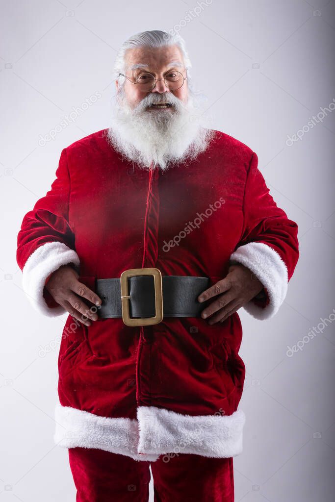 Santa Claus, without hat hands in belt  in white background